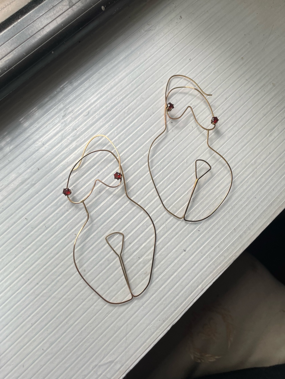 Delicate Gold-Tone Wire Women’s Body Earrings with Garnet Accent